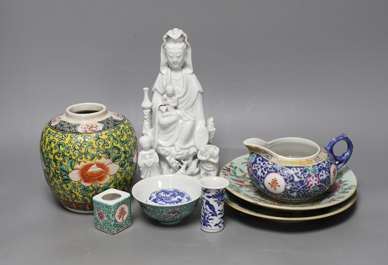 An 18th century Chinese Dehua blanc de chine Guanyin group, 23cm high, together with other various 19th / 20th century Chinese ceramics